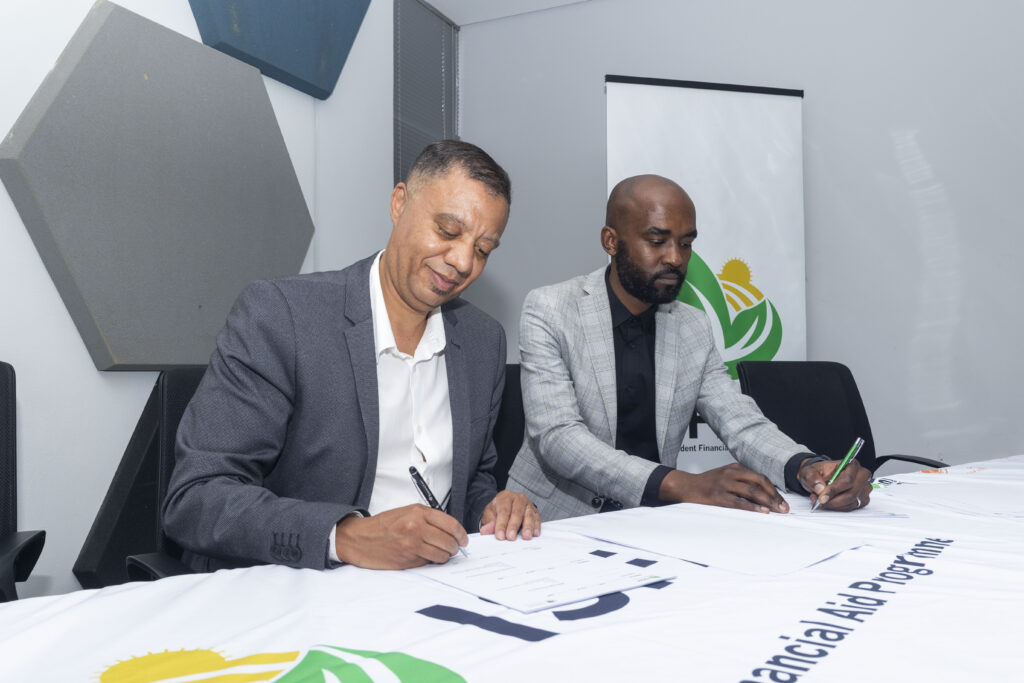 ISFAP CEO x Chancen SA Country Director signing the agreement ISFAP CEO x Chancen SA Country Director signing the agreement